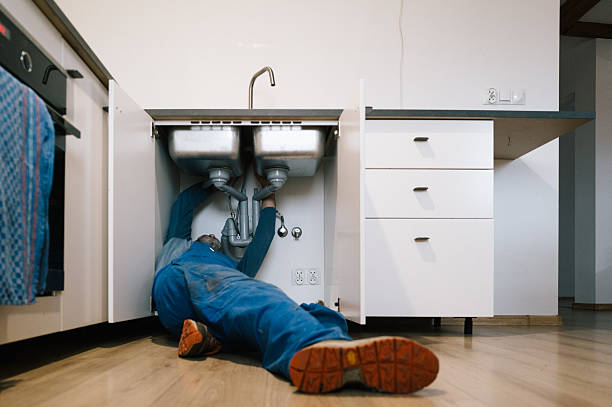 Professional Emergency Plumber technician working in Wooton, KY